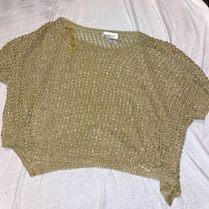 Cute gold shirt. Great to dress up for a night out!